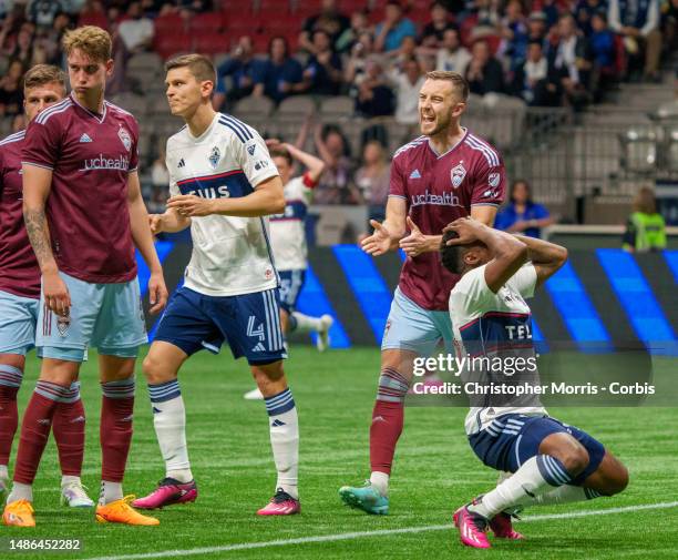 Javain Brown of the Vancouver Whitecaps FC and Danny Wilson 0f the Colorado Rapids react after Brown missed the goal while at BC Place on April 29,...