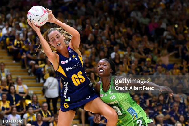 Cara Koenen of the Lightning wins the ball during the round seven Super Netball match between Sunshine Coast Lightning and West Coast Fever at...
