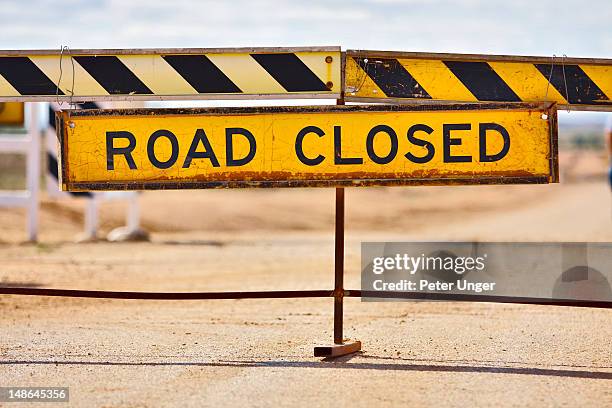 road closed sign on outback road. - road closed stock pictures, royalty-free photos & images