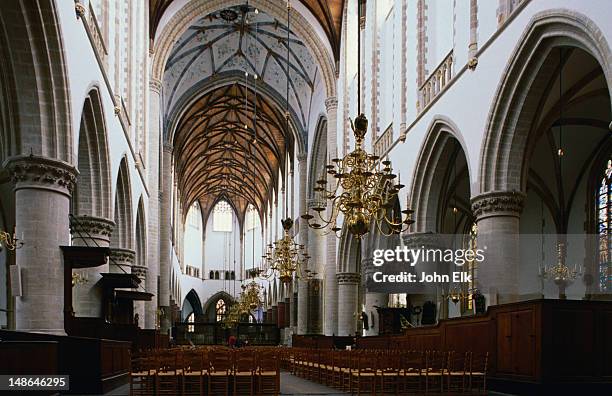 nave view of 15th century grote kerk. - haarlem netherlands stock pictures, royalty-free photos & images