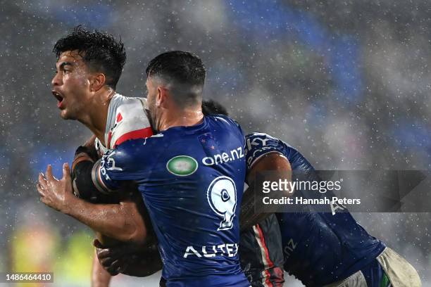 Joseph-Aukuso Suaalii of the Roosters charges forward during the round nine NRL match between New Zealand Warriors and Sydney Roosters at Mt Smart...