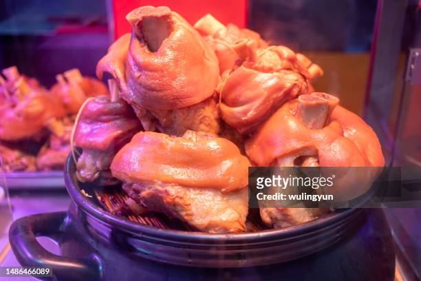 chinese delicatessen: pork shanks - trotter stock pictures, royalty-free photos & images