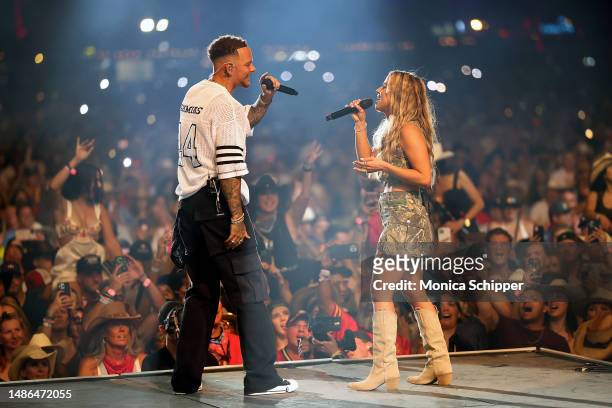 Kane Brown and Katelyn Brown perform onstage during Day 2 of the 2023 Stagecoach Festival on April 29, 2023 in Indio, California.