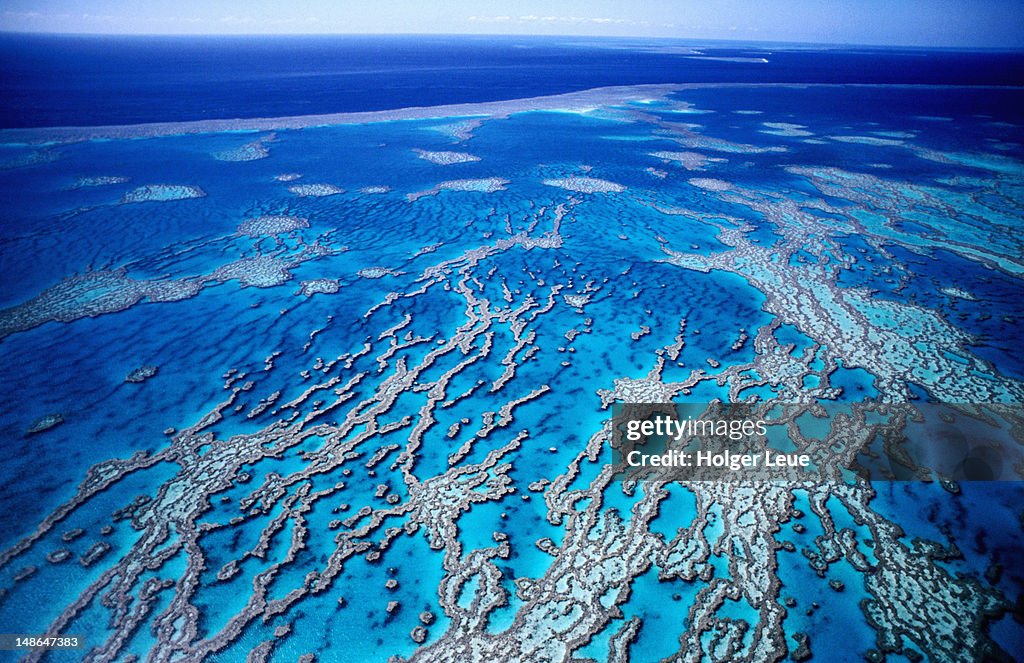 Aerial of Great Barrier Reef, near Whitsunday Islands.
