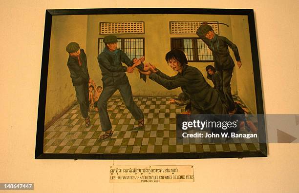 graphic paintings by former prisoners on display in tuol sleng museum (s-21) in phnom penh. . known as the museum of genocidal crimes (s-21), the former school was used by the khmer rouge as a detention and torture centre throughout the regime. - cambodia genocide stock pictures, royalty-free photos & images