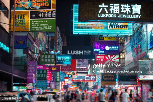 mongkok is one of the major shopping areas of hong kong - traffic light stock pictures, royalty-free photos & images