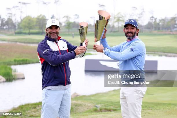 Pablo Larrazabal of Spain poses with his caddie after winning the tournament on Day Four of the Korea Championship Presented by Genesis at Jack...