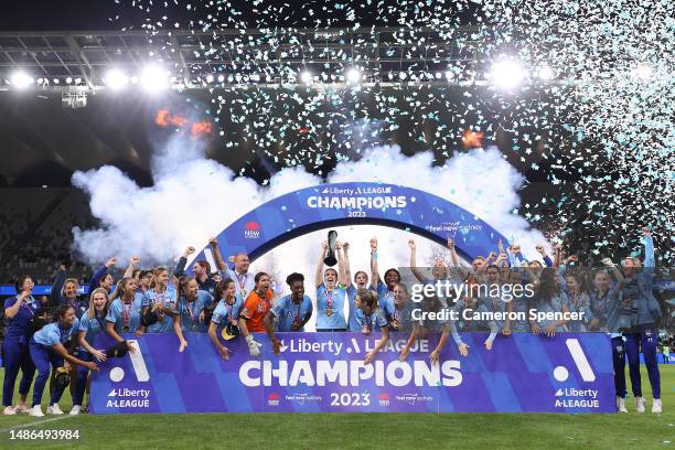 Sydney FC players celebrate the A-league trophy after winning the A-League Women's Grand Final match between Western United and Sydney FC at CommBank...