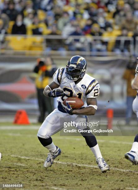 Running back LaDainian Tomlinson of the San Diego Chargers runs with the football against the Pittsburgh Steelers during a game at Heinz Field on...