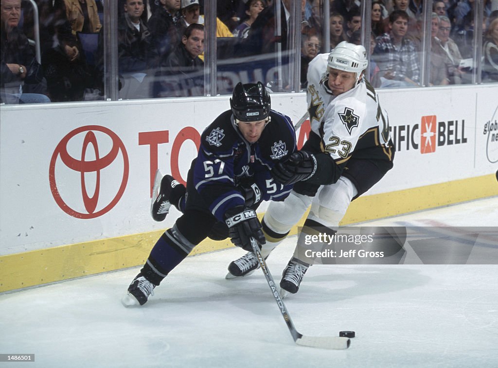 Steve Heinze skateS towards the puck