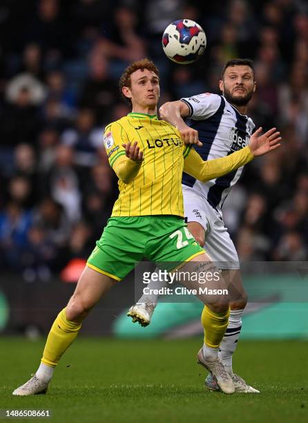 Josh Sargent of Norwich City is challenged by Erik Pieters of West Bromwich Albion during the Sky Bet Championship between West Bromwich Albion and...