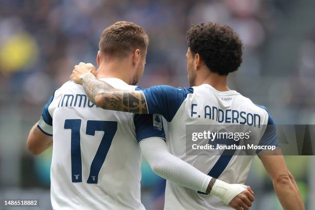 Felipe Anderson of SS Lazio celebrates with team mate Ciro Immobile after scoring to give the side a 1-0 lead during the Serie A match between FC...