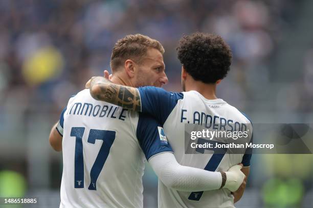 Felipe Anderson of SS Lazio celebrates with team mate Ciro Immobile after scoring to give the side a 1-0 lead during the Serie A match between FC...