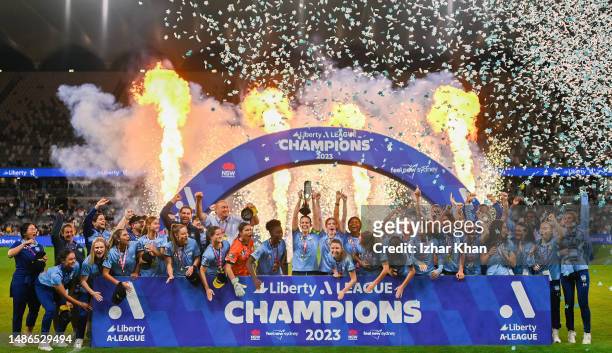 Sydney FC players celebrate the A-league trophy after winning the A-League Women's Grand Final match between Western United and Sydney FC at CommBank...