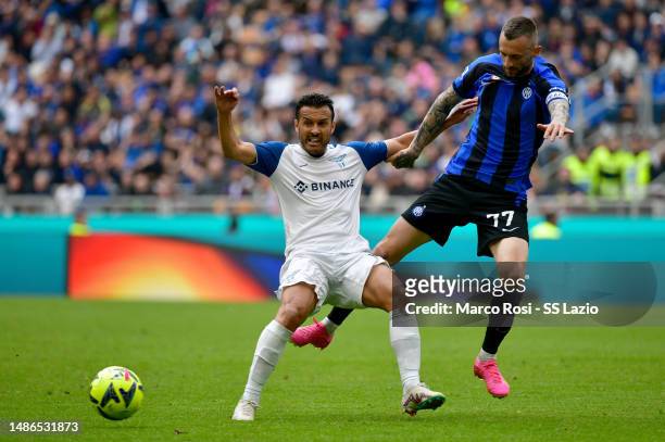 Pedro Rodriguez of SS Lazio compete for the ball with Marcelo Brozovic of FC Internazionale during the Serie A match between FC Internazionale and SS...