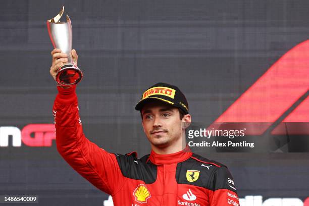 Third placed Charles Leclerc of Monaco and Ferrari celebrates on the podium during the F1 Grand Prix of Azerbaijan at Baku City Circuit on April 30,...