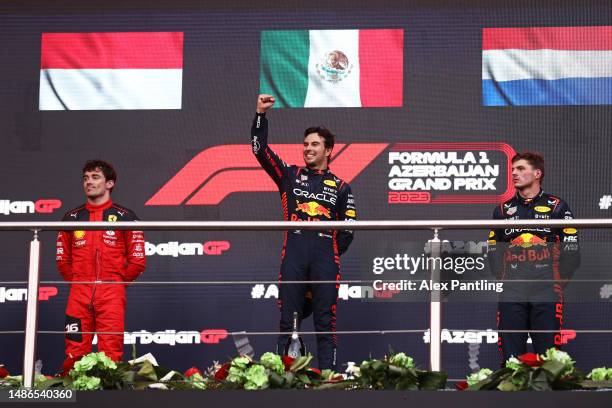 Race winner Sergio Perez of Mexico and Oracle Red Bull Racing Third placed Charles Leclerc of Monaco and Ferrari and Second placed Max Verstappen of...