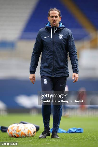 Darren Carter, Manager of Birmingham City, gives the team instructions during warm up prior to the Barclays FA Women's Championship match between...