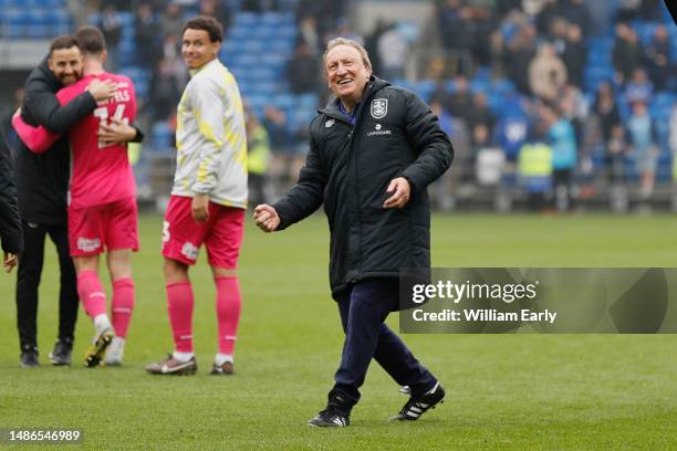 Neil Warnock the Head Coach of Huddersfield Town celebrates winning the Sky Bet Championship game between Cardiff City and Huddersfield Town at the...