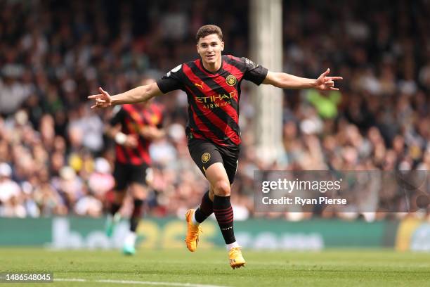 Julian Alvarez of Manchester City celebrates after scoring the team's second goal during the Premier League match between Fulham FC and Manchester...