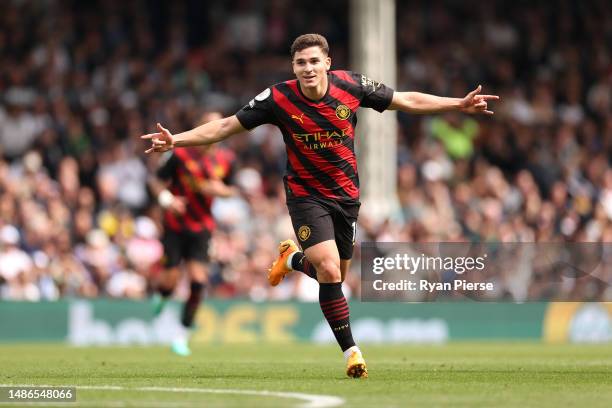 Julian Alvarez of Manchester City celebrates after scoring the team's second goal during the Premier League match between Fulham FC and Manchester...