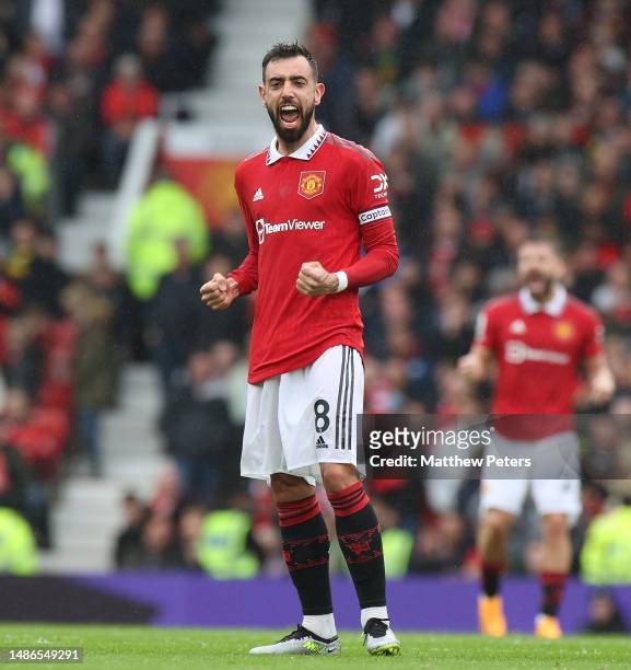 Bruno Fernandes of Manchester United celebrates scoring their first goal during the Premier League match between Manchester United and Aston Villa at...