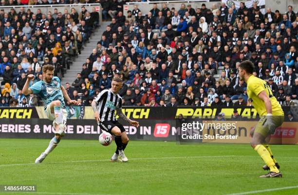 Stuart Armstrong of Southampton scores the team's first goal whilst under pressure from Kieran Trippier of Newcastle United during the Premier League...