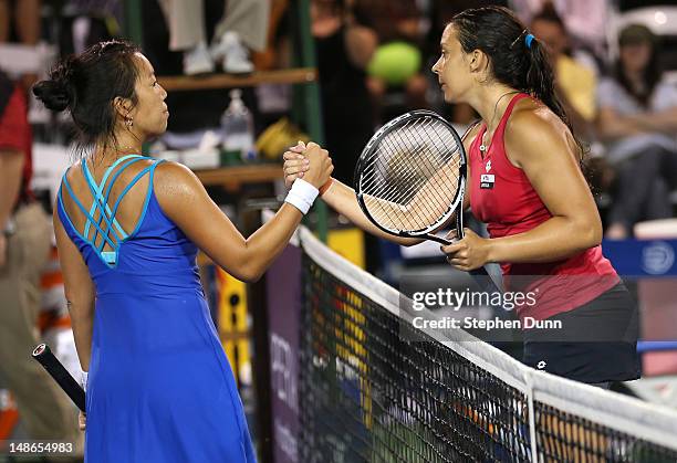 Marion Bartoli of France shakes hands with Vania King after their three hour and ten minute match during day five of the Mercury Insurance Open...