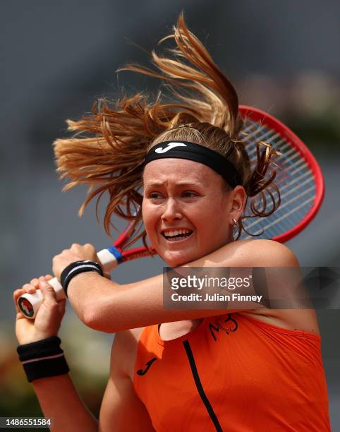 Marie Bouzkova of Czech Replublic in action against Jessica Pegula of USA during the women's third round match on Day Seven of the Mutua Madrid Open...