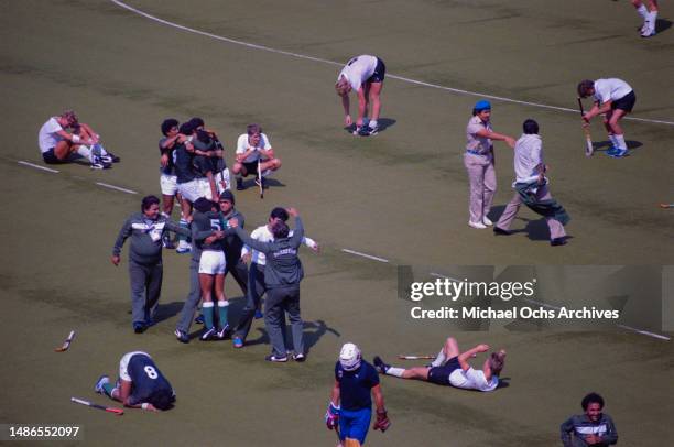 Pakistani hockey players and coaches celebrate after winning the final of the men's field hockey tournament of the 1984 Summer Olympics, between West...