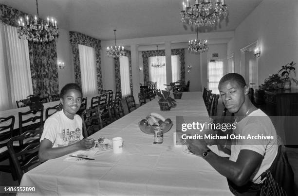 Two people, possibly athletes, in the athletes' village on the campus of the University of Southern California , during the 1984 Summer Olympics, in...