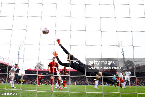 Illan Meslier of Leeds United attempts to save a goal scored by Jefferson Lerma of AFC Bournemouth, his team's first goal during the Premier League...