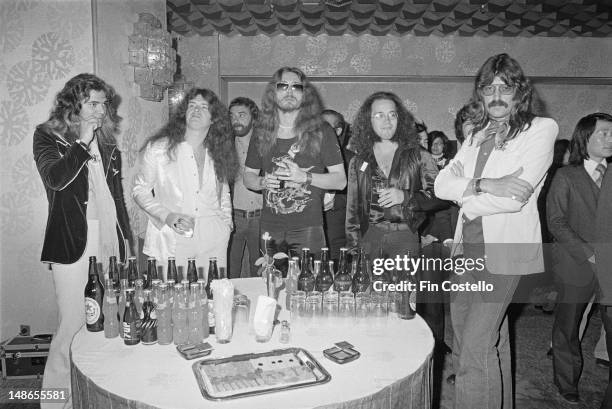 Rock group Deep Purple posed at a Warner Brothers record company press reception in Japan in December 1975. Left to right: guitarist Tommy Bolin ,...