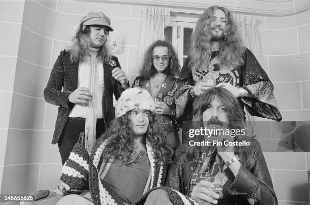 Rock group Deep Purple posed in Japan in December 1975. Left to right: top row - guitarist Tommy Bolin , drummer Ian Paice, singer David Coverdale....