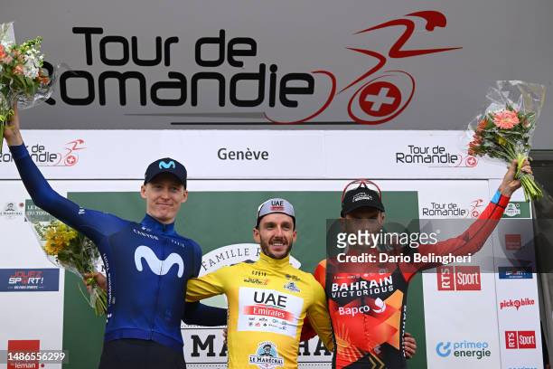 Matteo Jorgenson of The United States and Movistar Team on second place, race winner Adam Yates of United Kingdom and UAE Team Emirates - Yellow...
