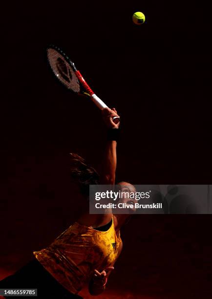 Daria Kasatkina serves against Lesia Tsurenko of the Ukraine during their third round match on day seven of the Mutua Madrid Open at La Caja Magica...