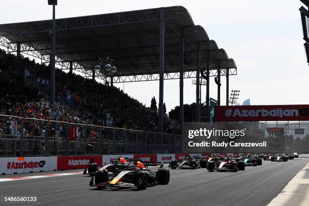 Max Verstappen of the Netherlands driving the Oracle Red Bull Racing RB19 leads Sergio Perez of Mexico driving the Oracle Red Bull Racing RB19 during...