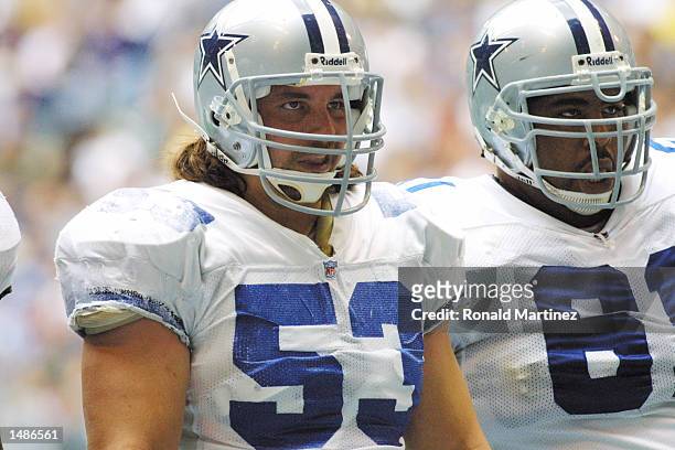 Mark Stepnoski and teammate Kelvin Garmon of the Dallas Cowboys look on during the game against the Philadelphia Eagles at Texas Stadium in Irving,...