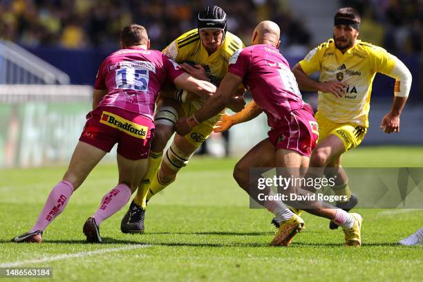 Ultan Dilane of La Rochelle takes on Tom Wyatt and Olly Woodburn of Exeter Chiefs during the Heineken Champions Cup Semi Finals match between La...