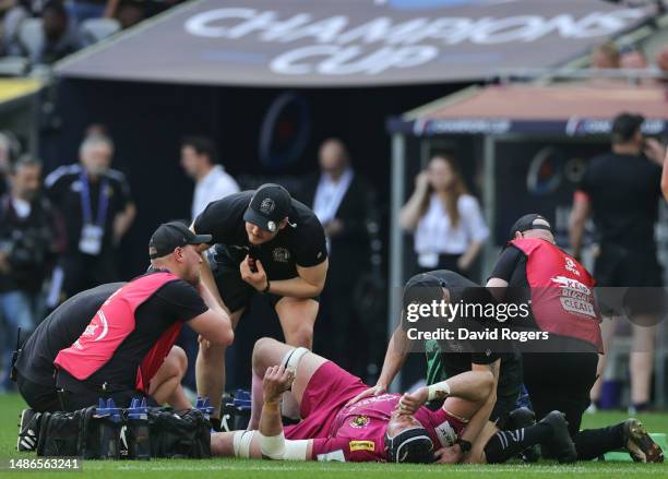 Jonny Gray of Exeter Chiefs receives medical treatment during the Heineken Champions Cup Semi Finals match between La Rochelle and Exeter Chiefs at...