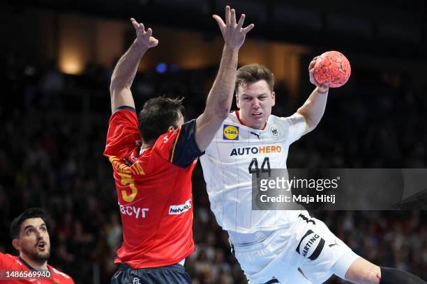Christoph Steinert of Germany tries to score as he is blocked by Jorge Maqueda of Spain during the EHF Euro Cup match between Germany and Spain on...
