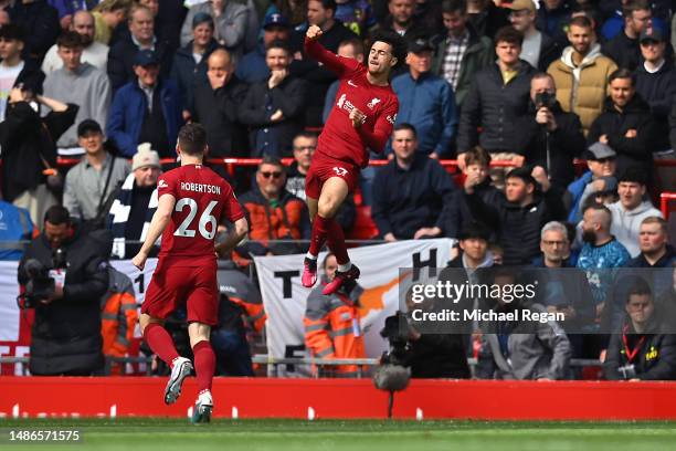 Curtis Jones of Liverpool celebrates after scoring the team's first goal during the Premier League match between Liverpool FC and Tottenham Hotspur...