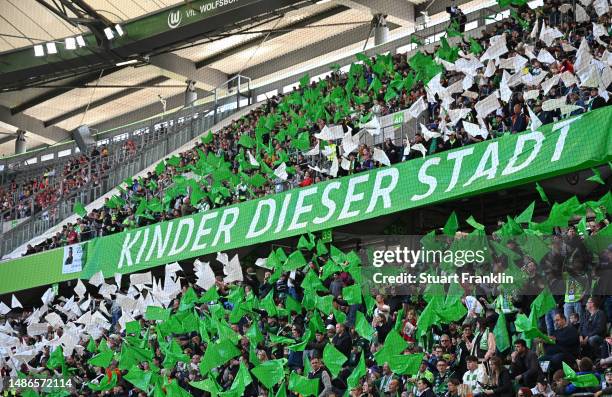 General view of fans of VfL Wolfsburg showing their support prior to the Bundesliga match between VfL Wolfsburg and 1. FSV Mainz 05 at Volkswagen...