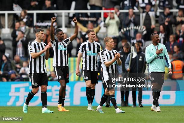 Alexander Isak of Newcastle United celebrates with teammates after the team's victory in the Premier League match between Newcastle United and...