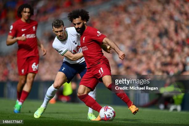 Ivan Perisic of Tottenham Hotspur battles for possession with Mohamed Salah of Liverpool during the Premier League match between Liverpool FC and...