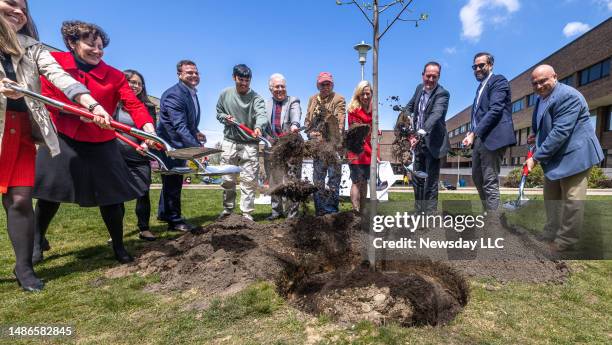 Stony Brook University president Maurie McInnis at Stony Brook University, in Stony Brook, New York with support from friends and officials plant a...