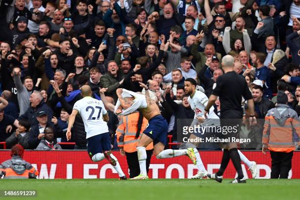 Richarlison of Tottenham Hotspur celebrates after scoring the team's third goal during the Premier League match between Liverpool FC and Tottenham...
