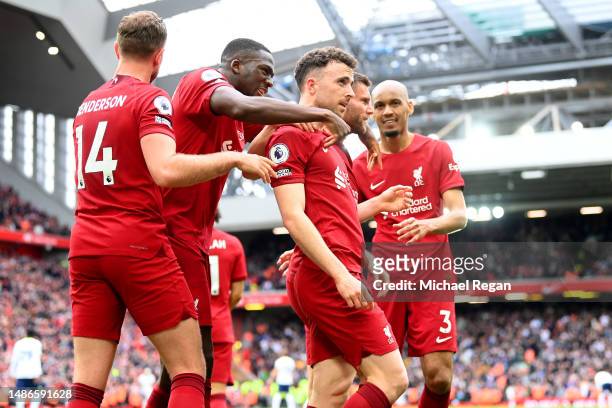 Diogo Jota of Liverpool celebrates with teammates after scoring the team's fourth goal during the Premier League match between Liverpool FC and...