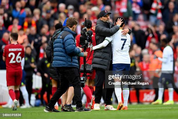 Juergen Klopp, Manager of Liverpool, embraces Son Heung-Min of Tottenham Hotspur during the Premier League match between Liverpool FC and Tottenham...