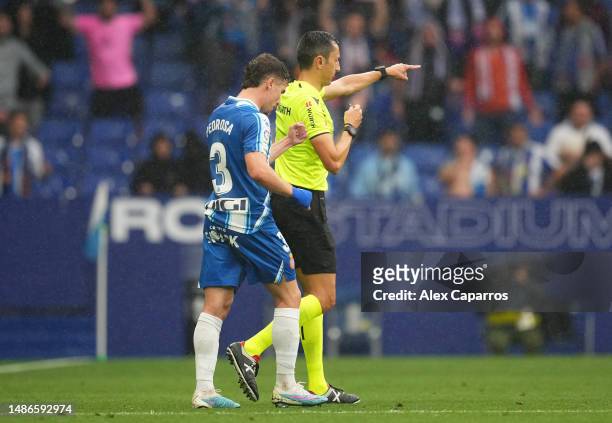 Match Referee Jose Sanchez awards a penalty to RCD Espanyol following a VAR check during the LaLiga Santander match between RCD Espanyol and Getafe...
